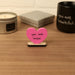 Heart-shaped Valentine mini sculpture with the phrase “you are loved,” styled as a small desk or shelf gift.